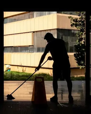 commercial janitorial employee mopping