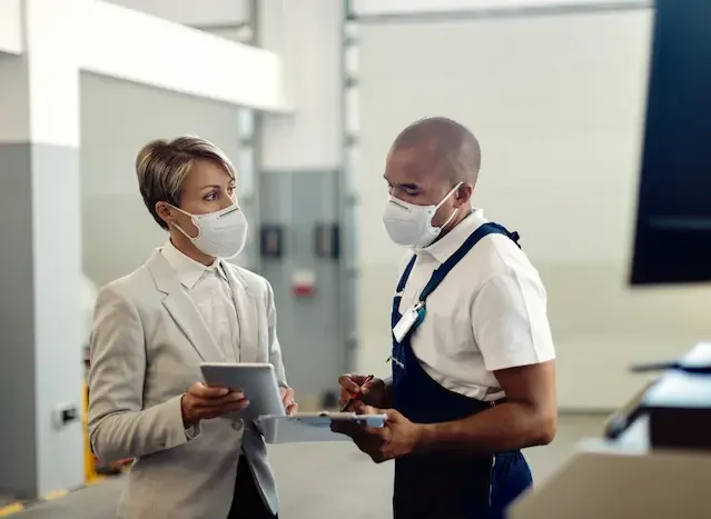 Janitor speaking with client